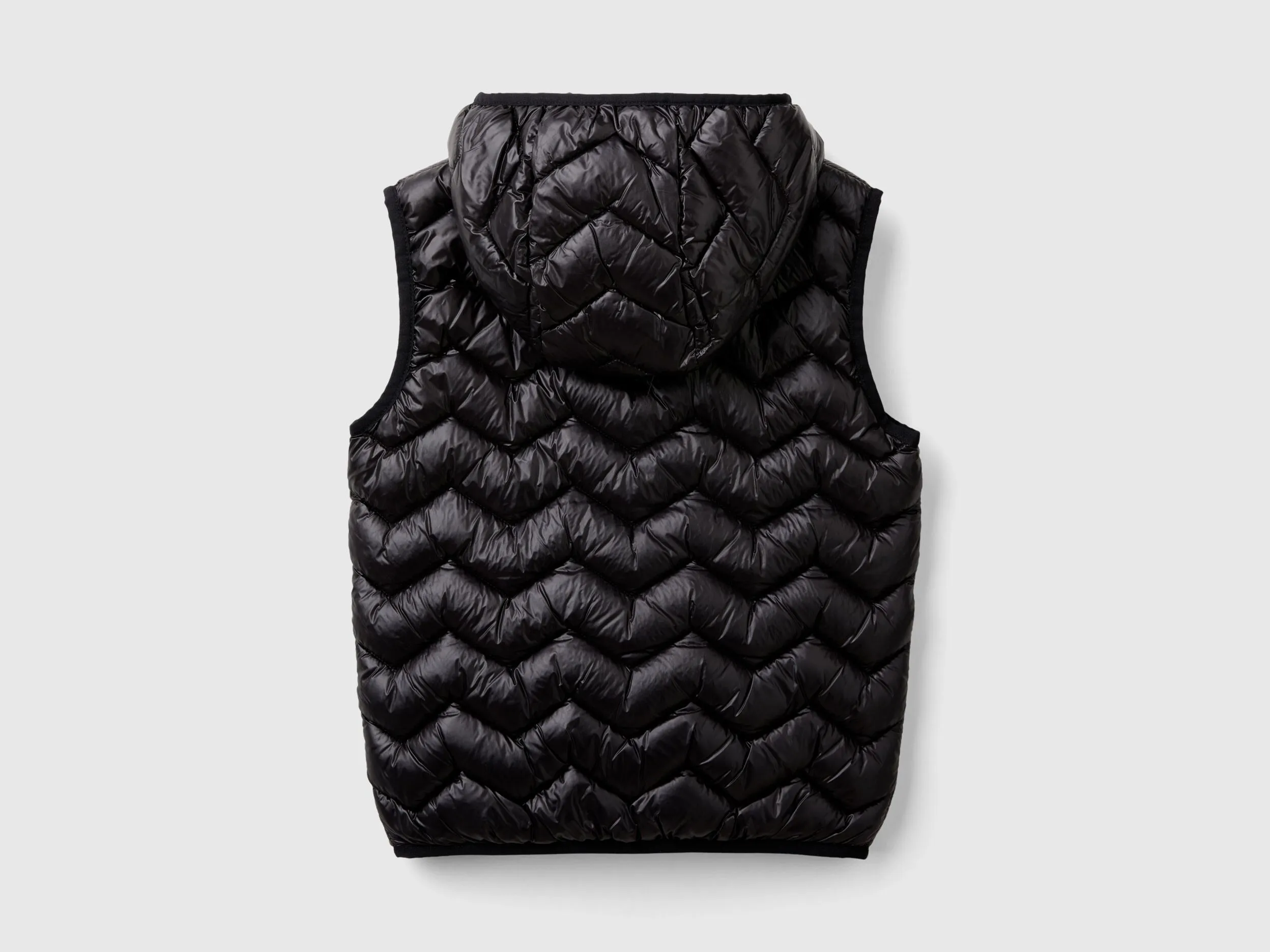 Padded vest in 3D wadding with hood - Black | Benetton