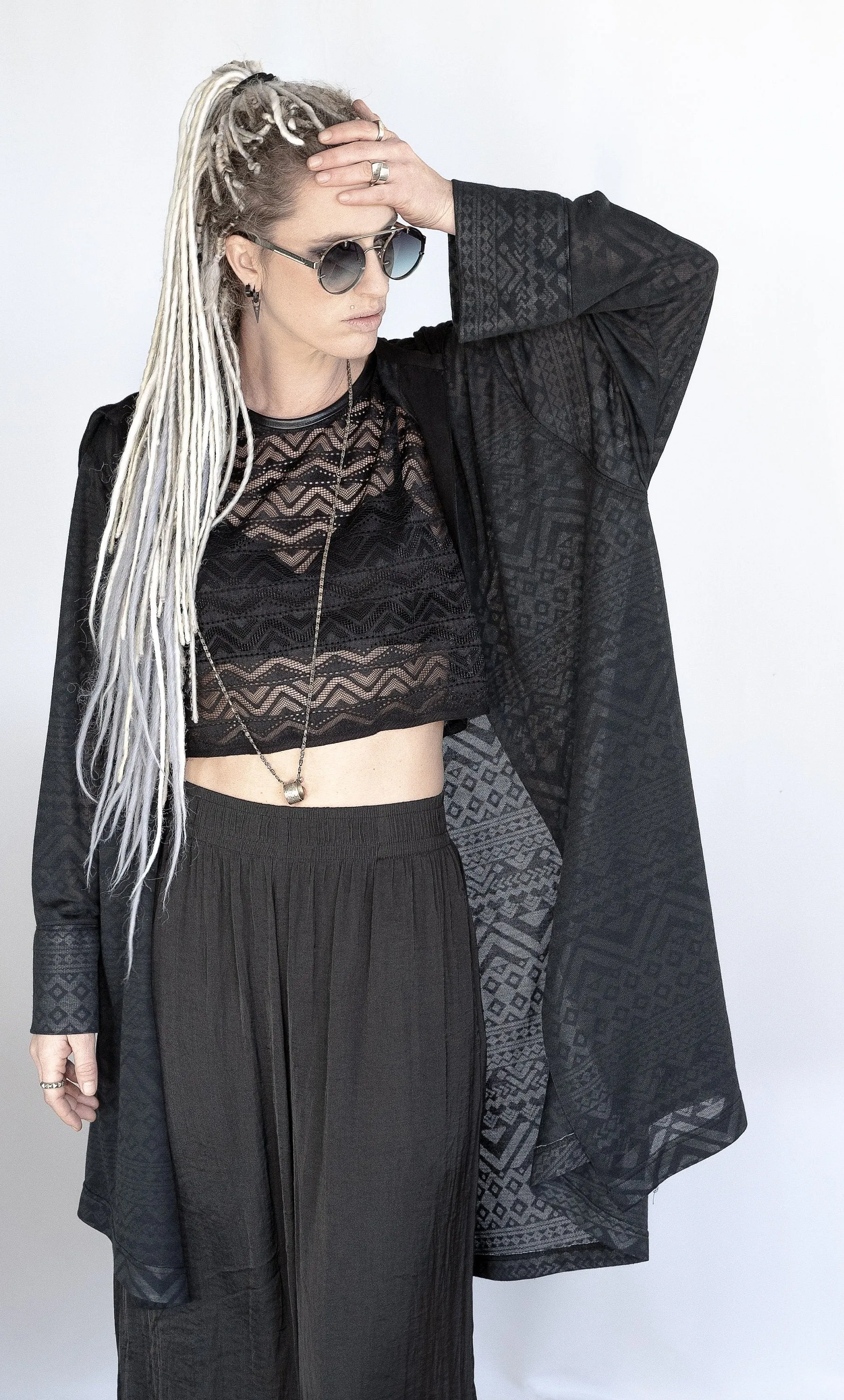 Tribal mesh leatherette trim crop top